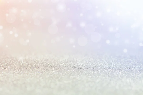 Gümüş arkaplan, renkli renklerle bokeh.