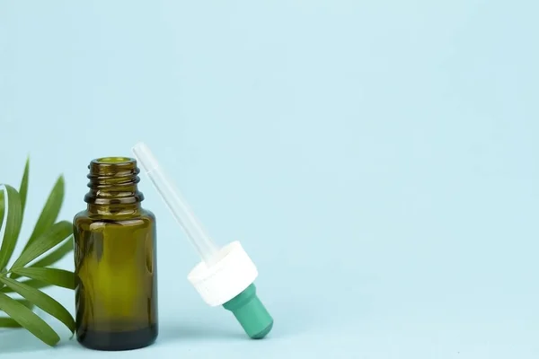 Medical bottles. Brown glass bottles. Medicines, drugs, pills. Brown jars on a blue background. Medicines in a jar.