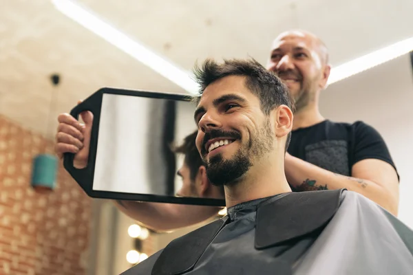 Hairdresser showing his work.. — Stock Photo, Image