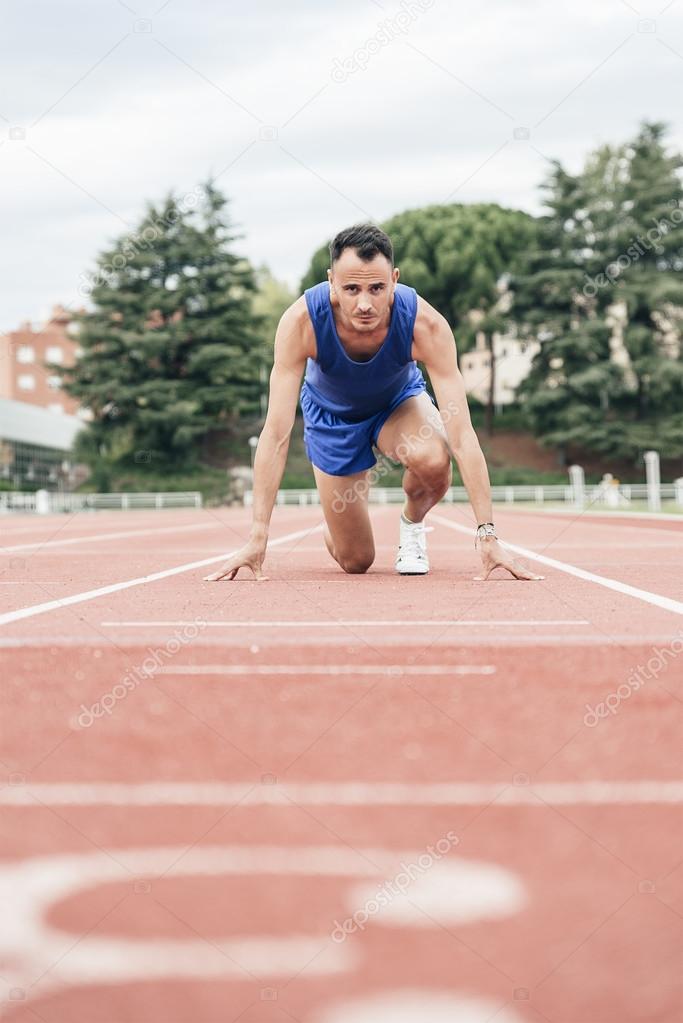 Man getting ready to start running