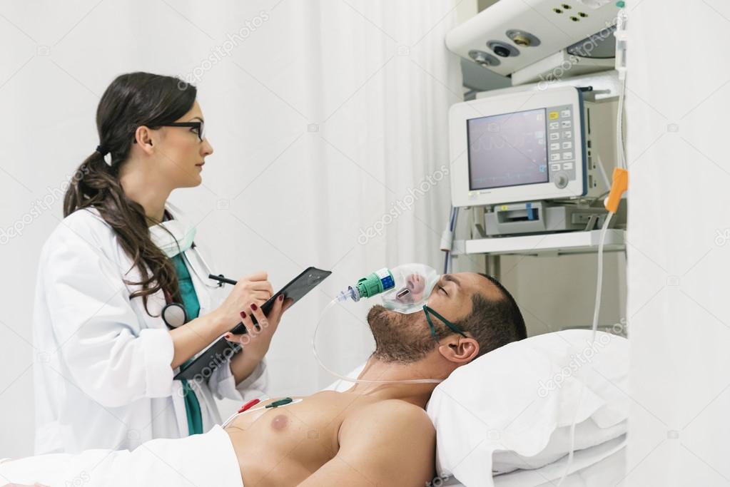Doctor is caring a sick person