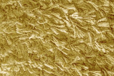 Uzun saç halısının sarısı, kürk deseni tasarımcılar için yakın plan.