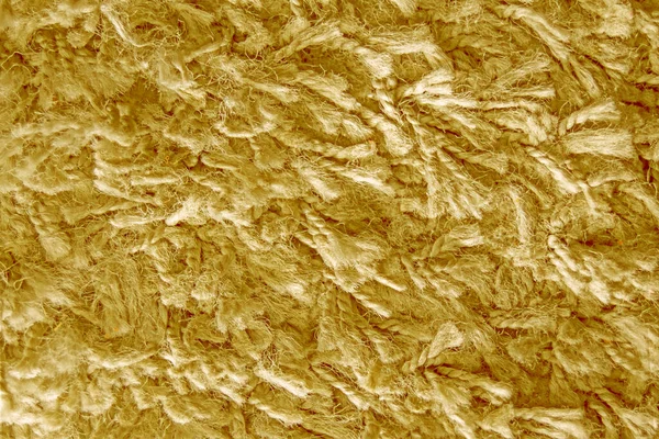 Uzun saç halısının sarısı, kürk deseni tasarımcılar için yakın plan.