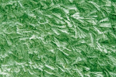 Uzun saç halısının yeşil renkli dokusu, kürk dokusu tasarımcılar ve arka plan için yakın plan