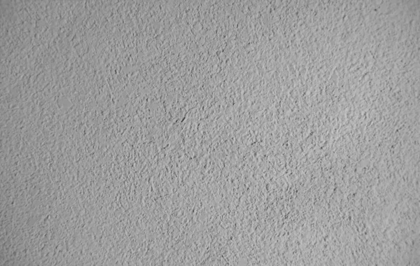 灰色の壁に抽象的な粒状のテクスチャ デザイン要素や背景として使用できます — ストック写真
