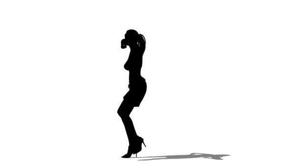 Silhouet van dansende vrouw — Stockvideo