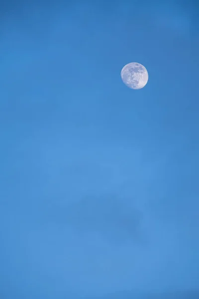 moon and clouds in the sky