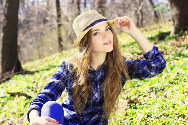 Portrait of young girl in blue shirt with — Stock Photo, Image