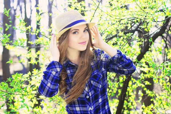 Portrait of young girl in blue shirt with — Stock Photo, Image