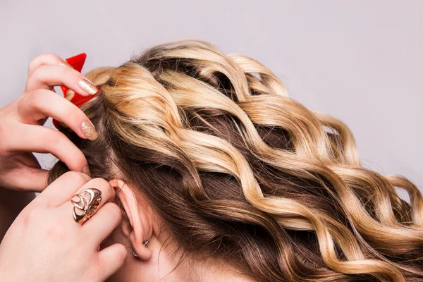 Strand of curly blond hair on his arm — Stock Photo, Image