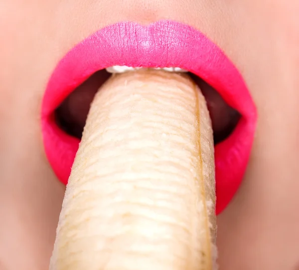 Sexy woman eating banana — Stock Photo, Image