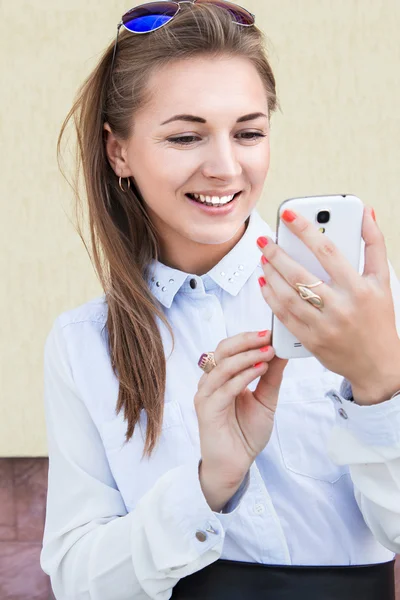 Beautiful sexy, businesswoman in suit .Telefon, business ,negotiations — Stock Photo, Image