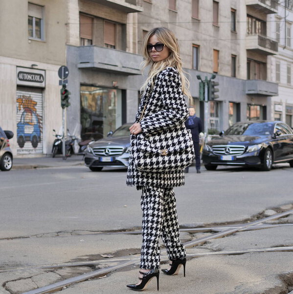 Fashion blogger Erika Pelosini posing for photographers before Dolce & Gabbana fashion show during Milano fashion week spring summer 2020