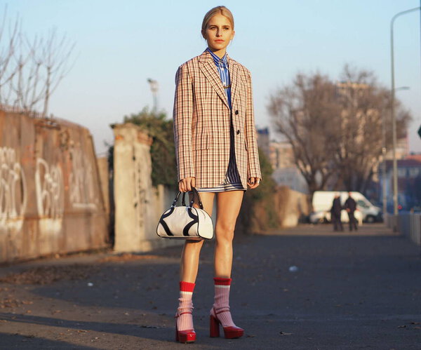 Caroline Daur street style outfit before Prada fashion show during Milan fashion week Spring/Summer