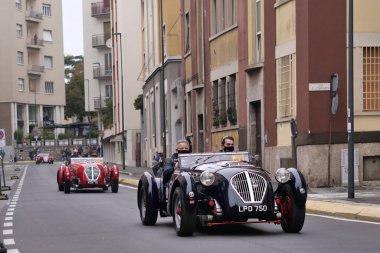 1000 mil, yıllık antika araba yarışı. Brescia 'nın ilk özel sahnesi..