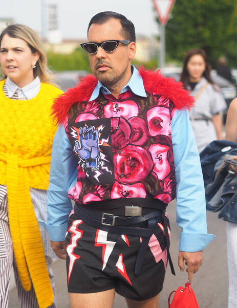 Fashion blogger street style outfit before Prada fashion show during Milan fashion week Spring/Summer collections