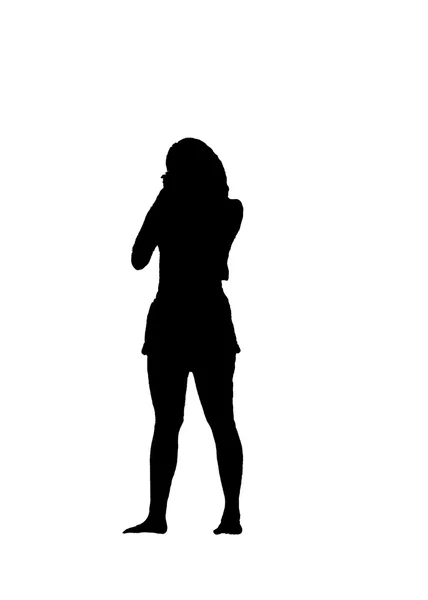 Silhouette of a girl in shorts — Stock Photo, Image