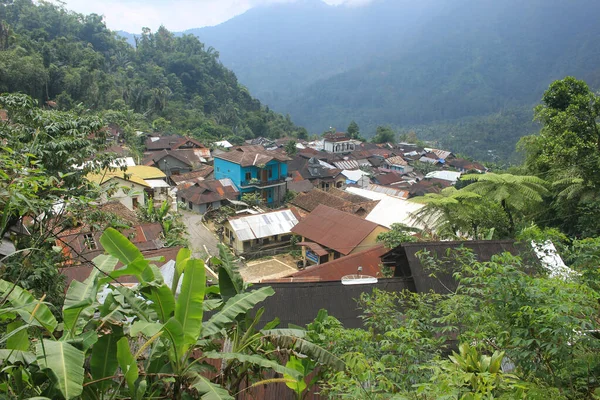 The photo depicts tolerance between Muslims and Christians, showing a mosque and church building side by side and harmoniously.