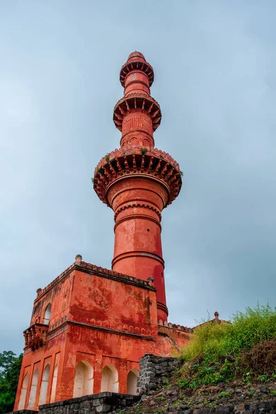 Chand Minar at Daulatabad fort in Maharashtra, India. It was built in 1435 by Ala-ud-din Bahmani to celebrate his occupation of the fort. This minaret is an outstanding example of Islamic art.