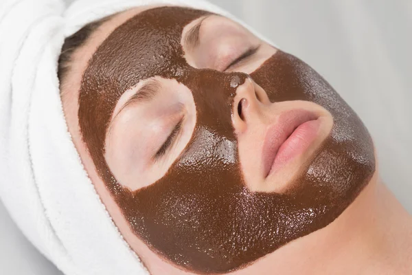 Woman chocolate face-pack — Stock Photo, Image