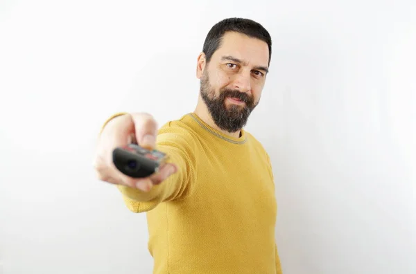 Glimlachende Man Met Baard Een Geïsoleerde Witte Achtergrond Houdt Een — Stockfoto