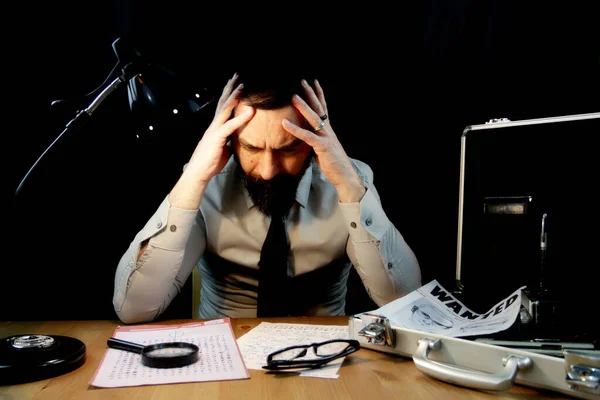 Detective Sitting Tired Holding Hands Head Examining Documents Zodiac Serial — Foto de Stock