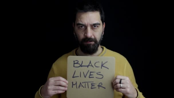 Bearded Man Isolated Black Background Holding Sign His Hand Inscription — Stock Video