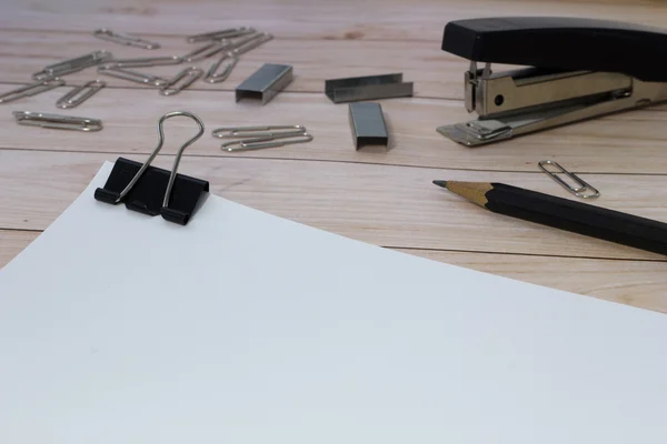 Stapler, paper and pencil — Stock Photo, Image