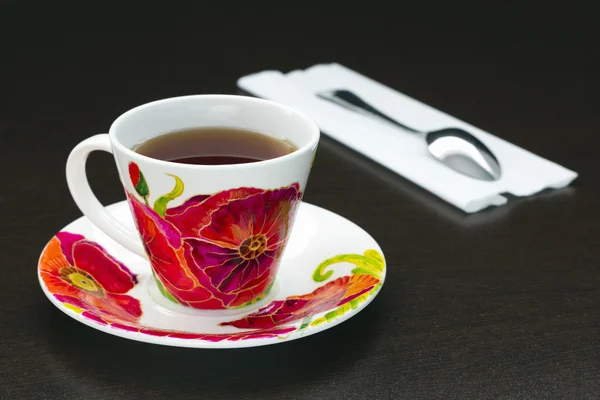 Tasse de thé avec coquelicots et cuillère — Photo