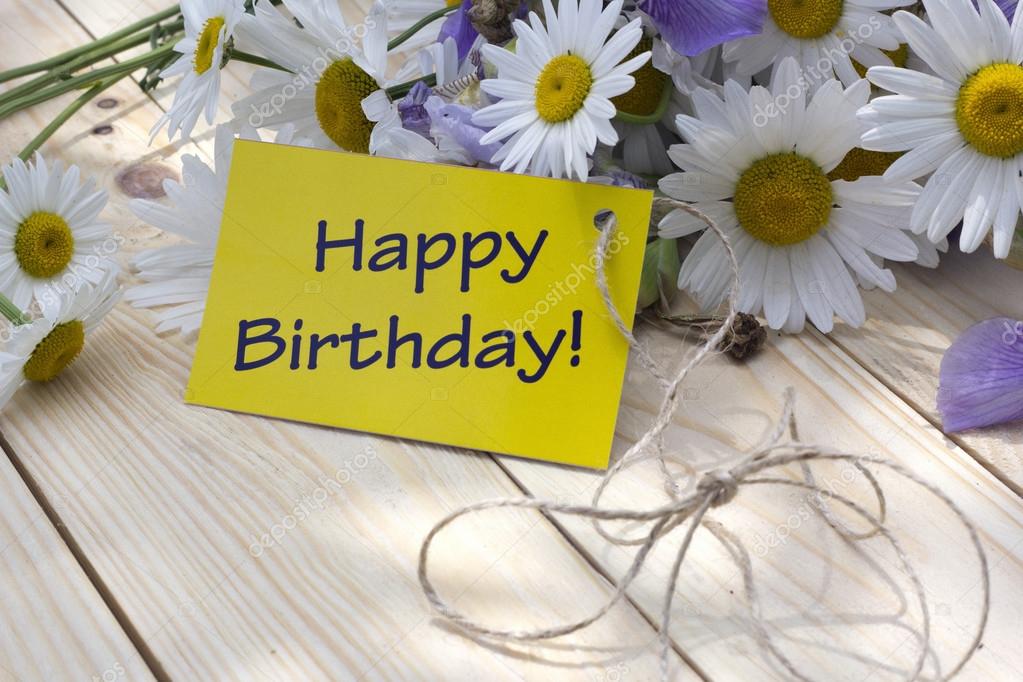 Download - Happy birthday card with daisies - Stock Image. 