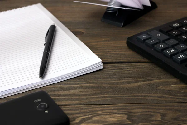 Pens , notepad , calculator and business cards — Stock Photo, Image