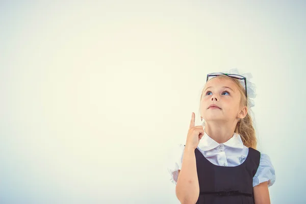 Schoolgirl get an idea, isolated — Stock Photo, Image