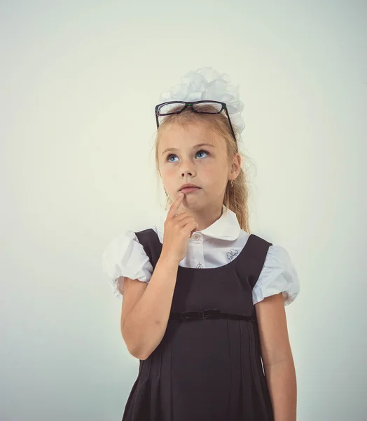 Schoolgirl thinking, isolated — Stock Photo, Image