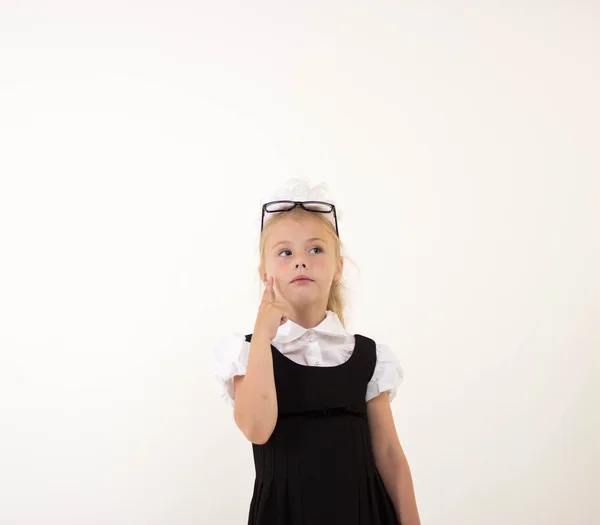 Schoolgirl thinking, isolated — Stock Photo, Image