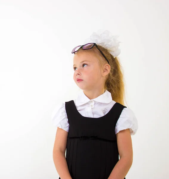 Schoolgirl thinking — Stock Photo, Image