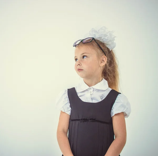 Schoolgirl thinking — Stock Photo, Image