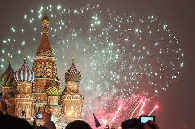 Moscow fireworks on New Year evening, outdoors clipart
