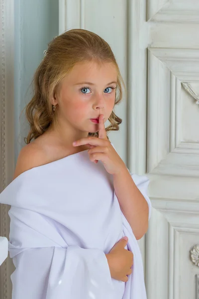 Little girl angel little girl sleeping finger in mouth gesture — Stock Photo, Image