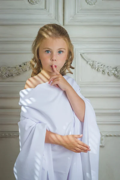 Little girl angel little girl sleeping finger in mouth gesture — Stock Photo, Image