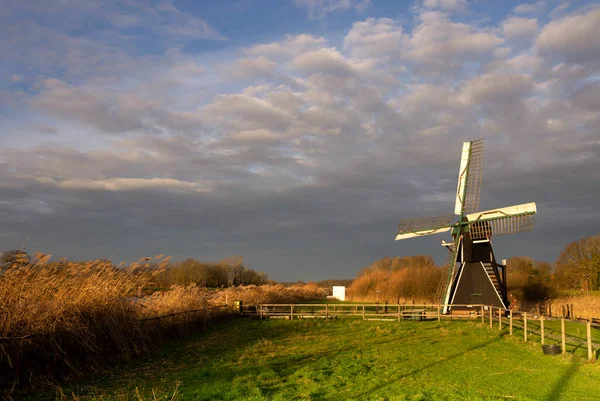 The Follega windmill under a heavy clouded sky — Stock Photo, Image