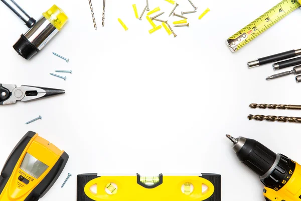 Körben sárga eszközök — Stock Fotó