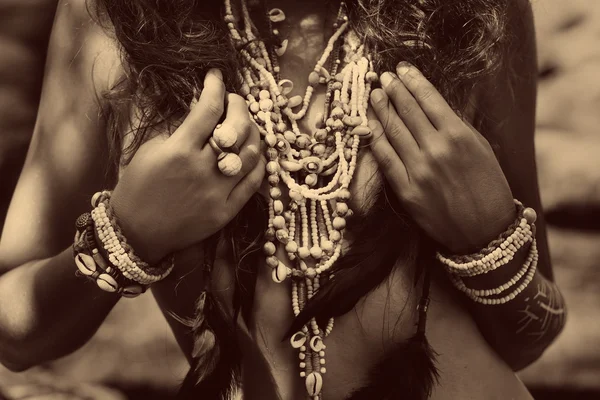 Boho model posing at stone backround. Close up of boho jewelry — Stock Photo, Image