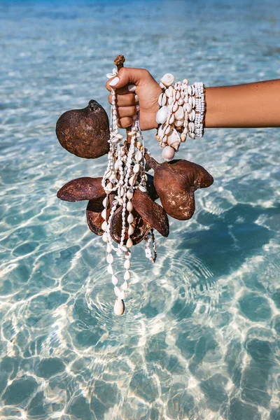 Woman Holding Tropical Branch Necklace Made Seashells Sea Shore Background — Stock Photo, Image