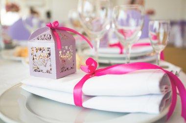 wedding table setting with white flowers and decoration