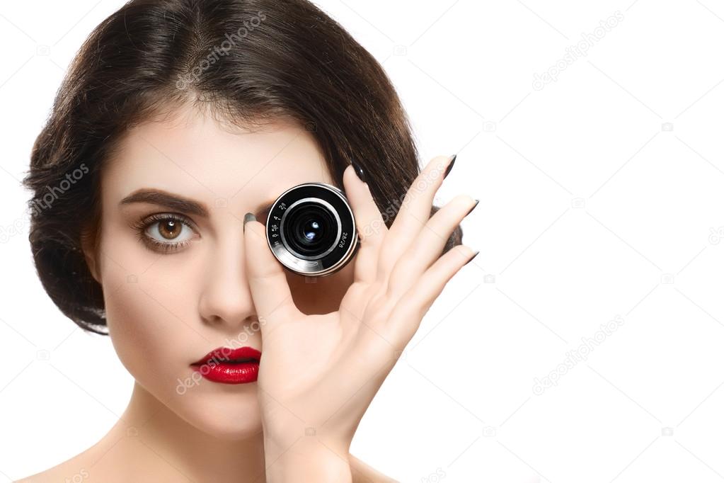 Woman with camera lens