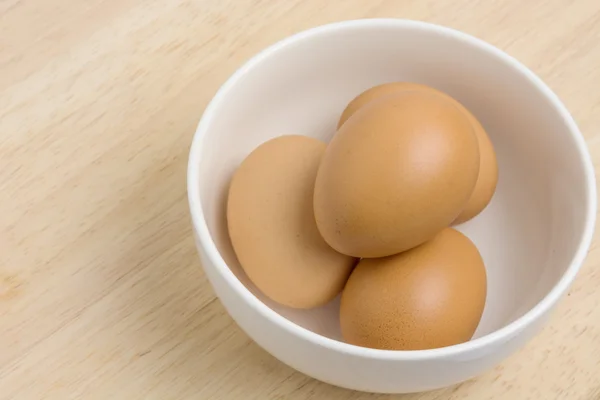 Eggs in a bowl for food preparation — Stock Photo, Image