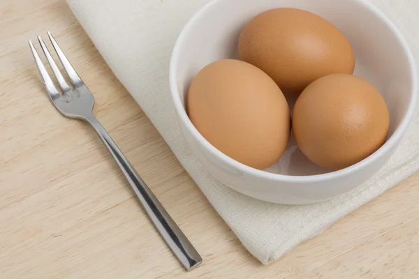 Eggs in a bowl for food preparation — Stock Photo, Image