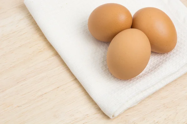 Raw eggs laid on the table — Stock Photo, Image