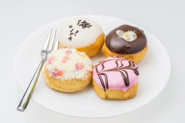 Sabores de rosquilla de 4 piezas . — Foto de Stock