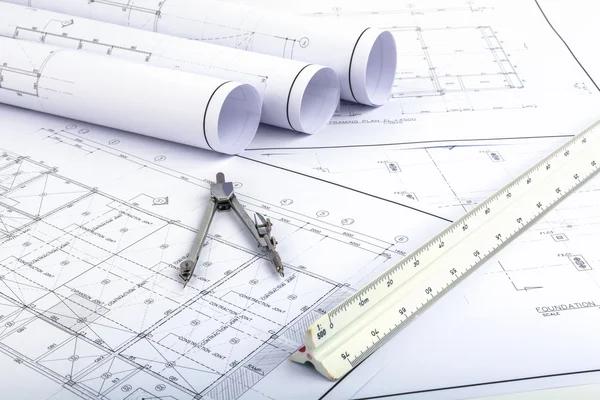 Compasses and Architect scale ruler on plan drawing — Stock Photo, Image